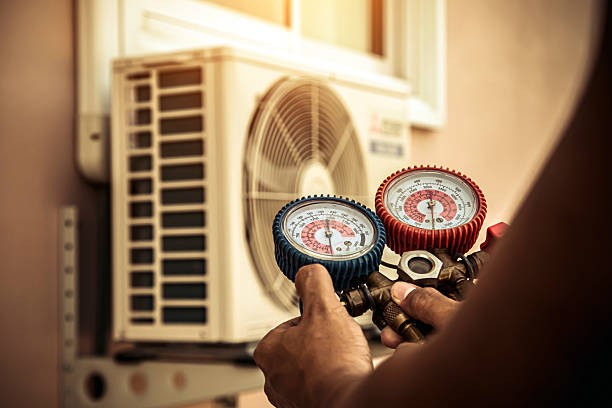 Professional Hvac technician working in Denton, MD
